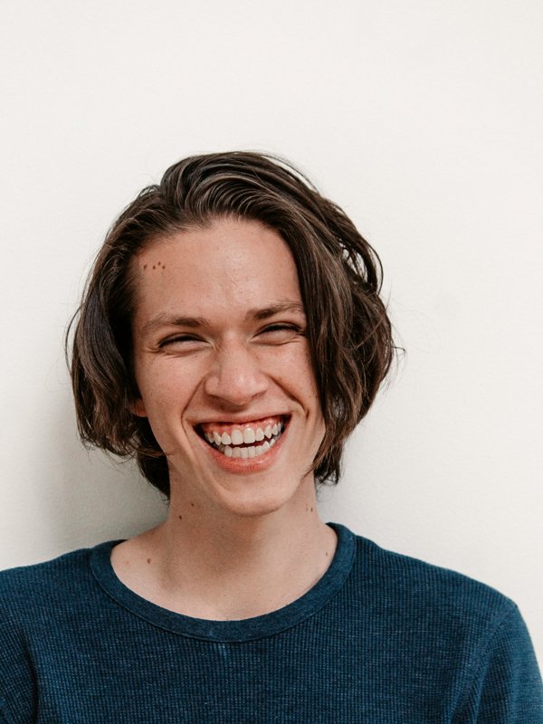 Original photo of person laughing